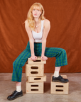 Margaret is wearing Gingham Western Pants in Green and Cropped Tank in vintage tee off-white