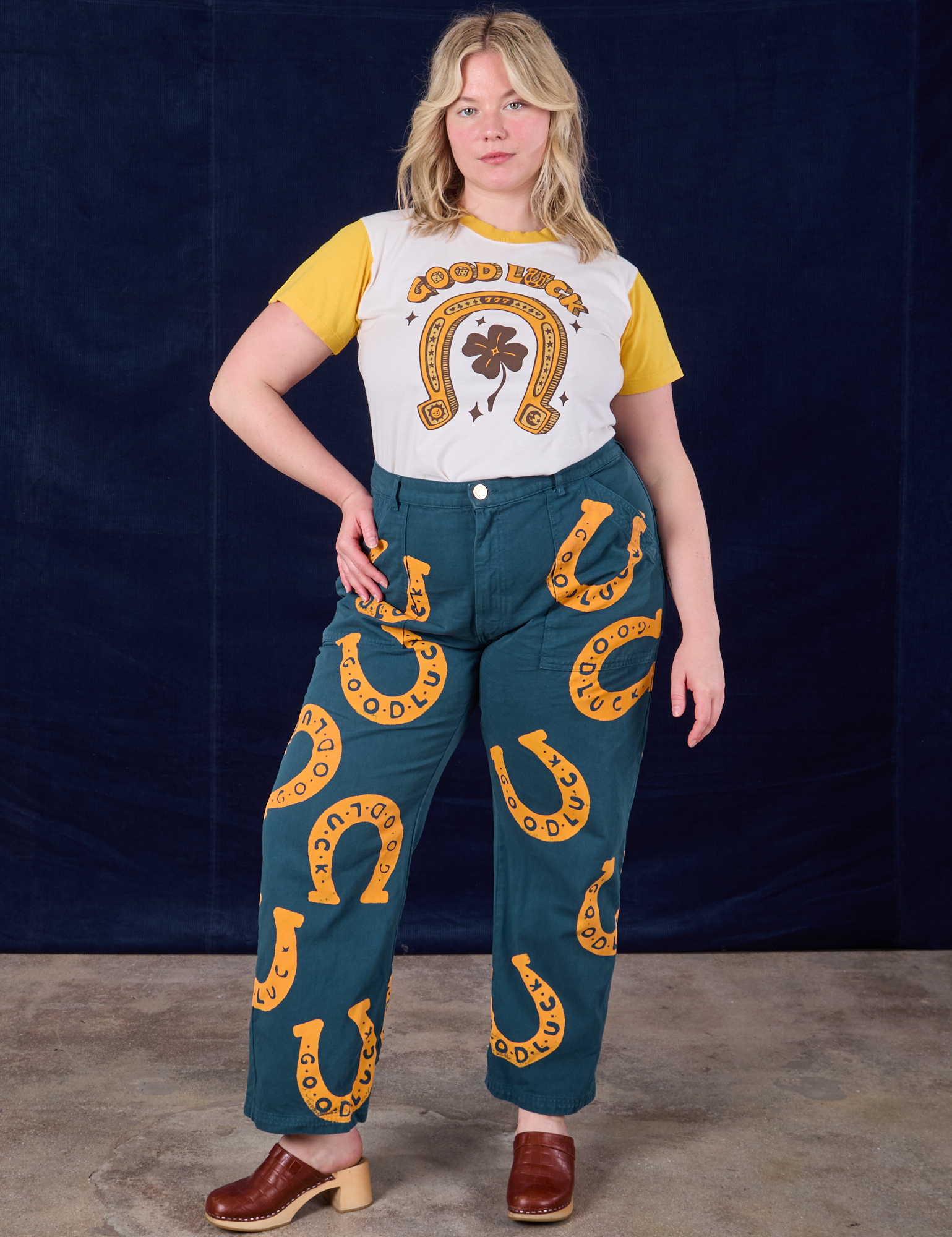 Lish is wearing Paintstamped Horseshoe Work Pant and Horseshoe Organic Tee