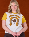 Lish is 5'8" and wearing XS Golden Horseshoe Organic Tee