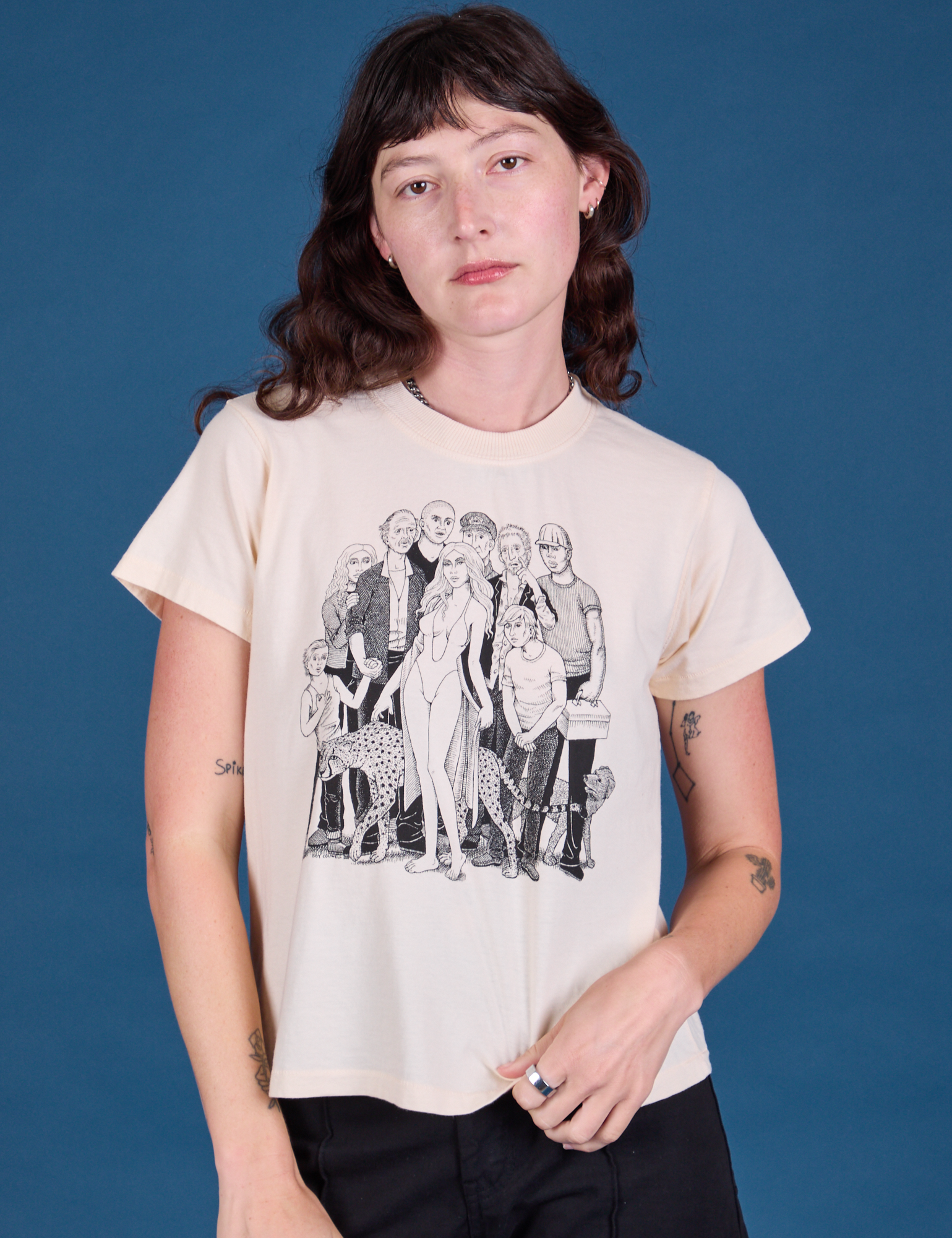 Alex is 5'8" and wearing Vintage Tee in Group Show