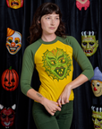 Alex is 5'8" and wearing P Raglan Tee in Creature