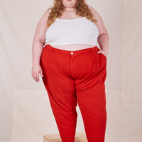 Catie is wearing Heavyweight Trousers in Mustang Red and vintage off-white Cropped Cami