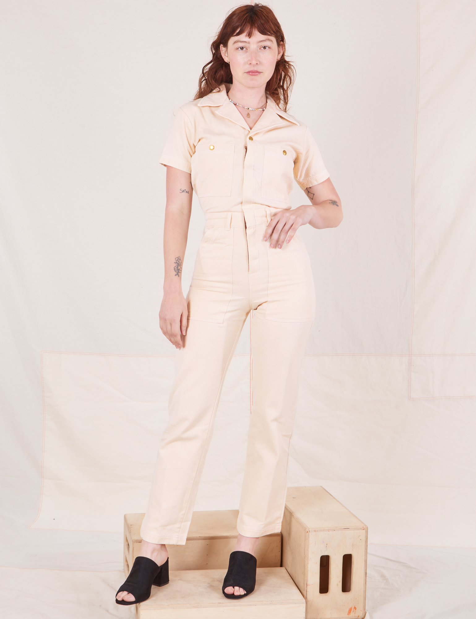 Heritage Short Sleeve Jumpsuit in Natural worn by Alex