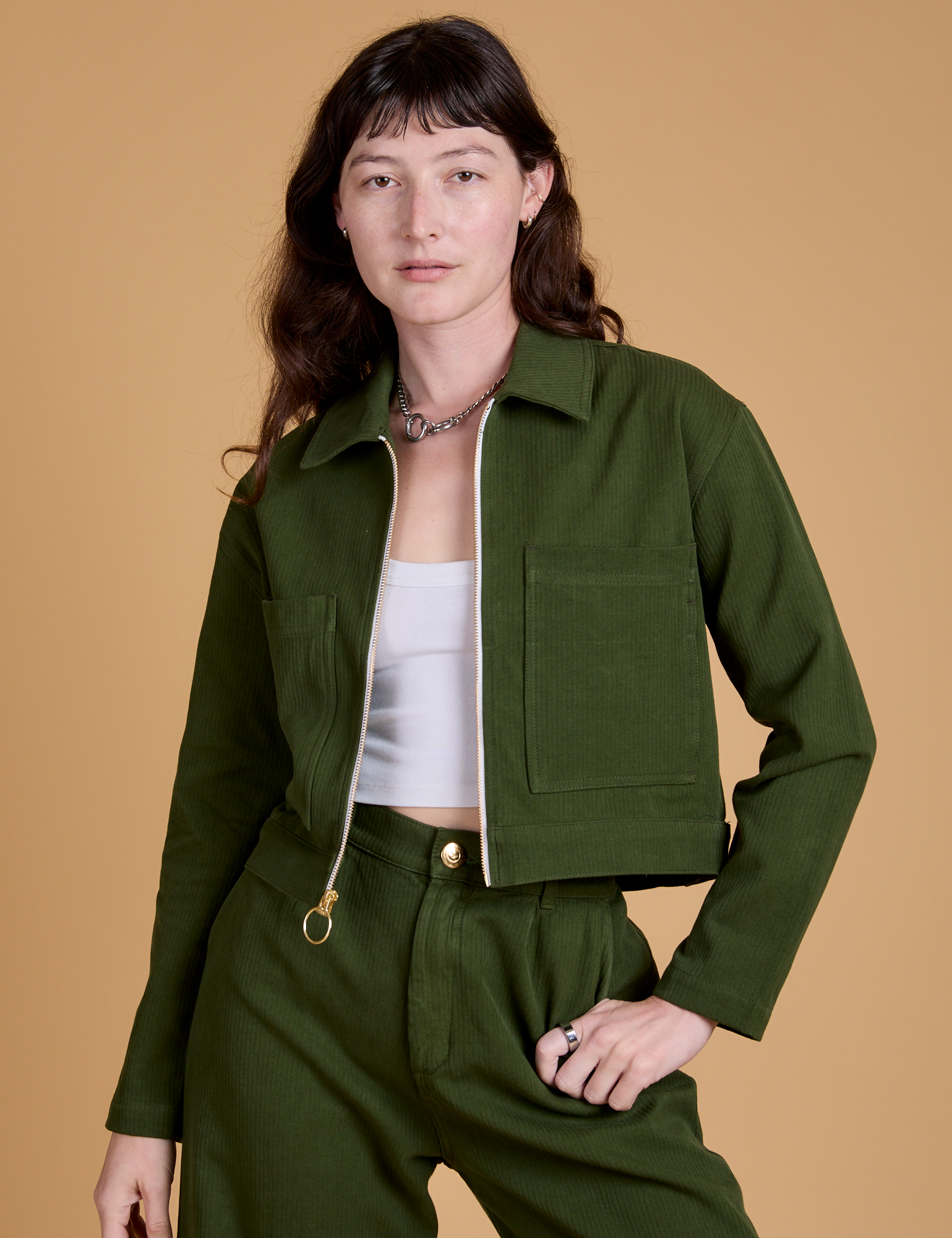 Alex is 5’8” and wearing P Heritage Mechanic Jacket in Evergreen