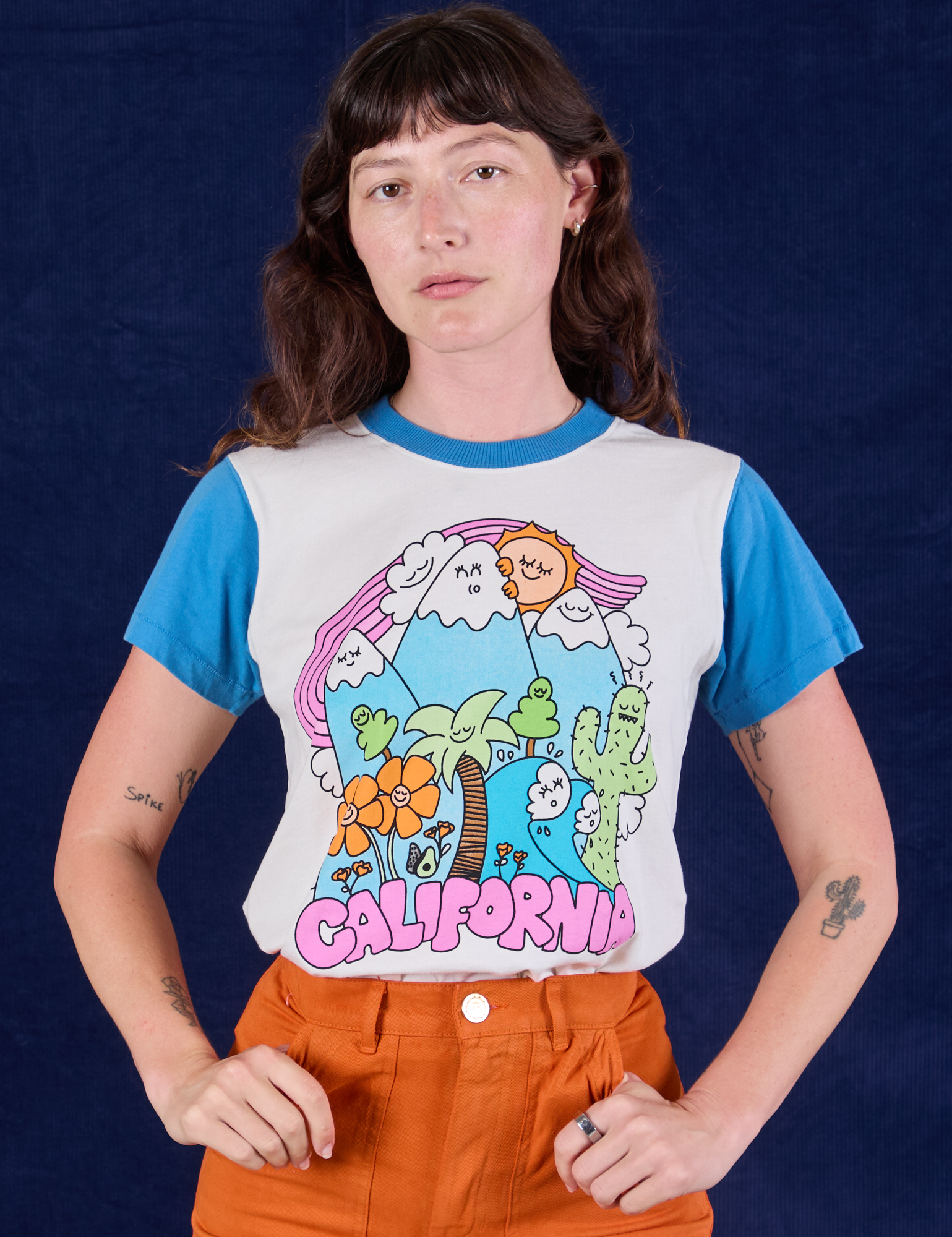 Alex is 5'8" and wearing P Anniversary Tee in California