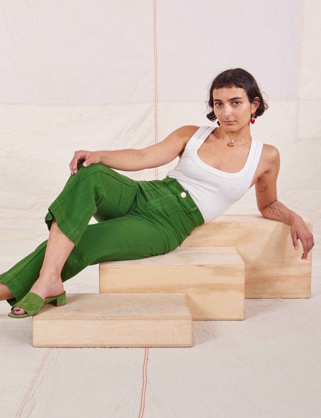 Soraya is wearing Heritage Westerns in Lawn Green and vintage off-white Cropped Tank Top