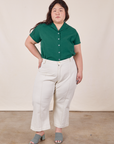 Ashley is wearing Pantry Button-Up in Hunter Green tucked into vintage off-white Petite Western Pants