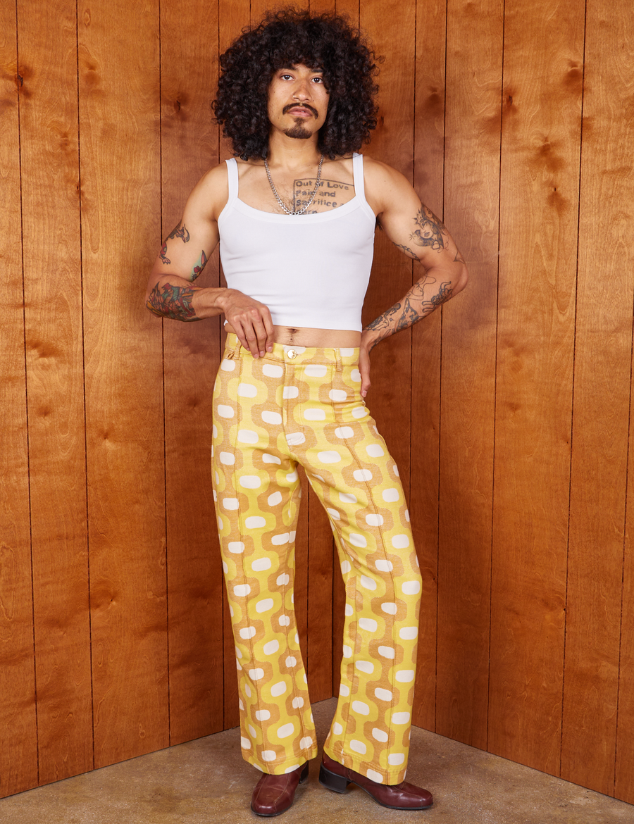 Jesse is 5'8" and wearing XS Western Pants in Yellow Jacquard