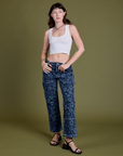 Mid-Rise Carpenter Jeans in Lazy Daisy and vintage tee white Cropped Tank on Alex