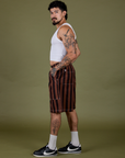 Side view of Longline Work Shorts in Fudgesicle Brown and vintage tee white Cropped Tank