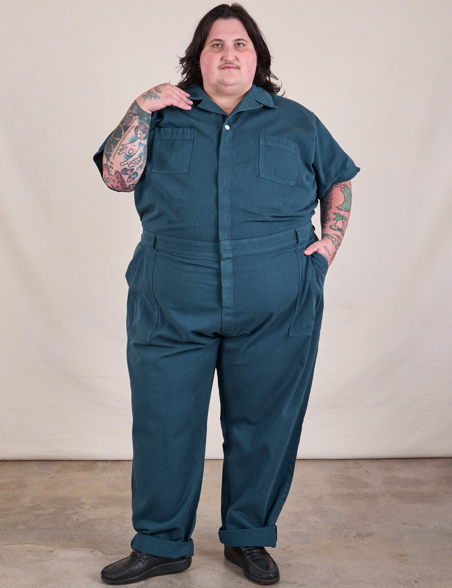 Sam is 5'10" and wearing 4XL Long Jumpsuit in Lagoon