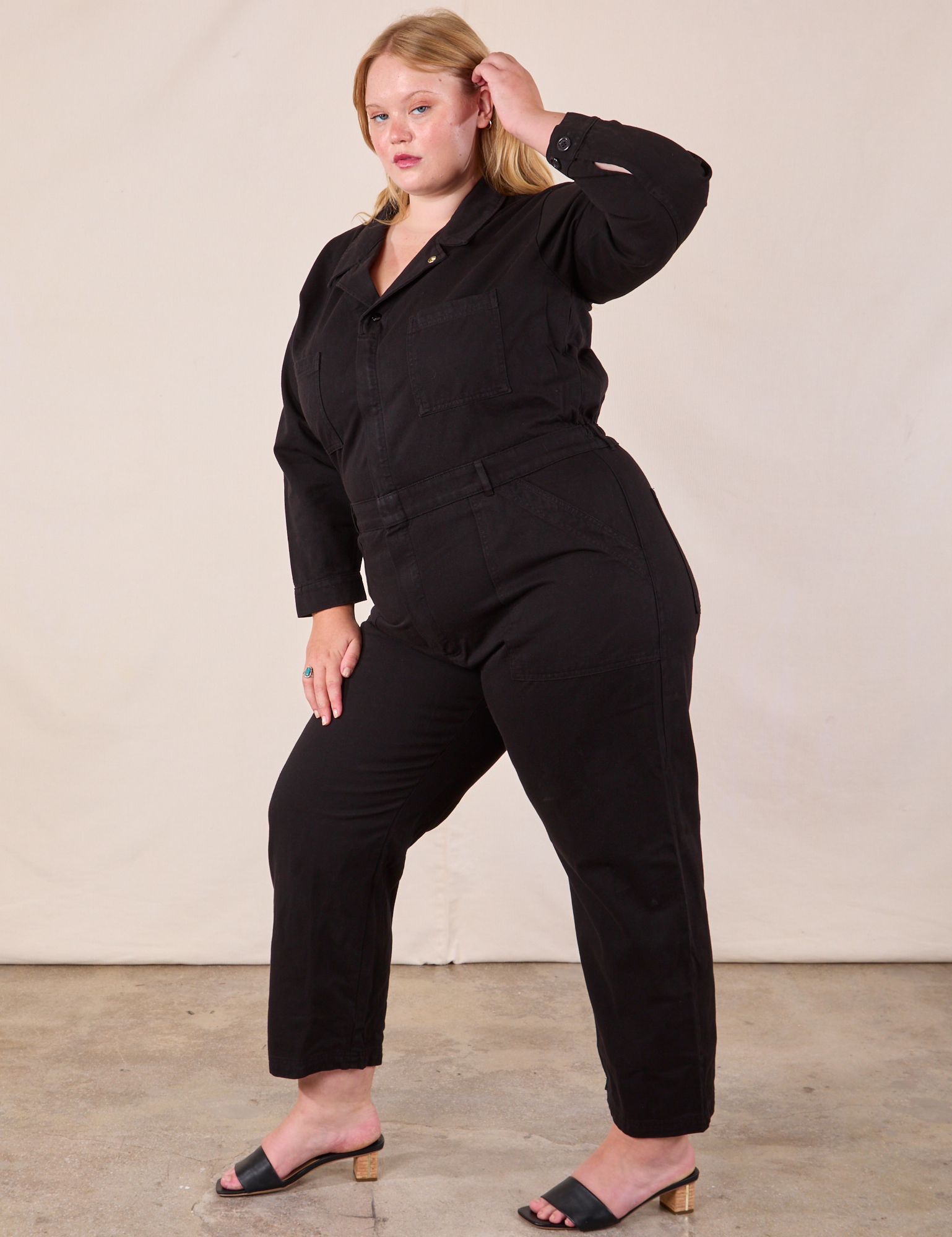 Long Sleeve Jumpsuit in Basic Black angled front view on Juliet