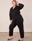 Long Sleeve Jumpsuit in Basic Black angled front view on Juliet