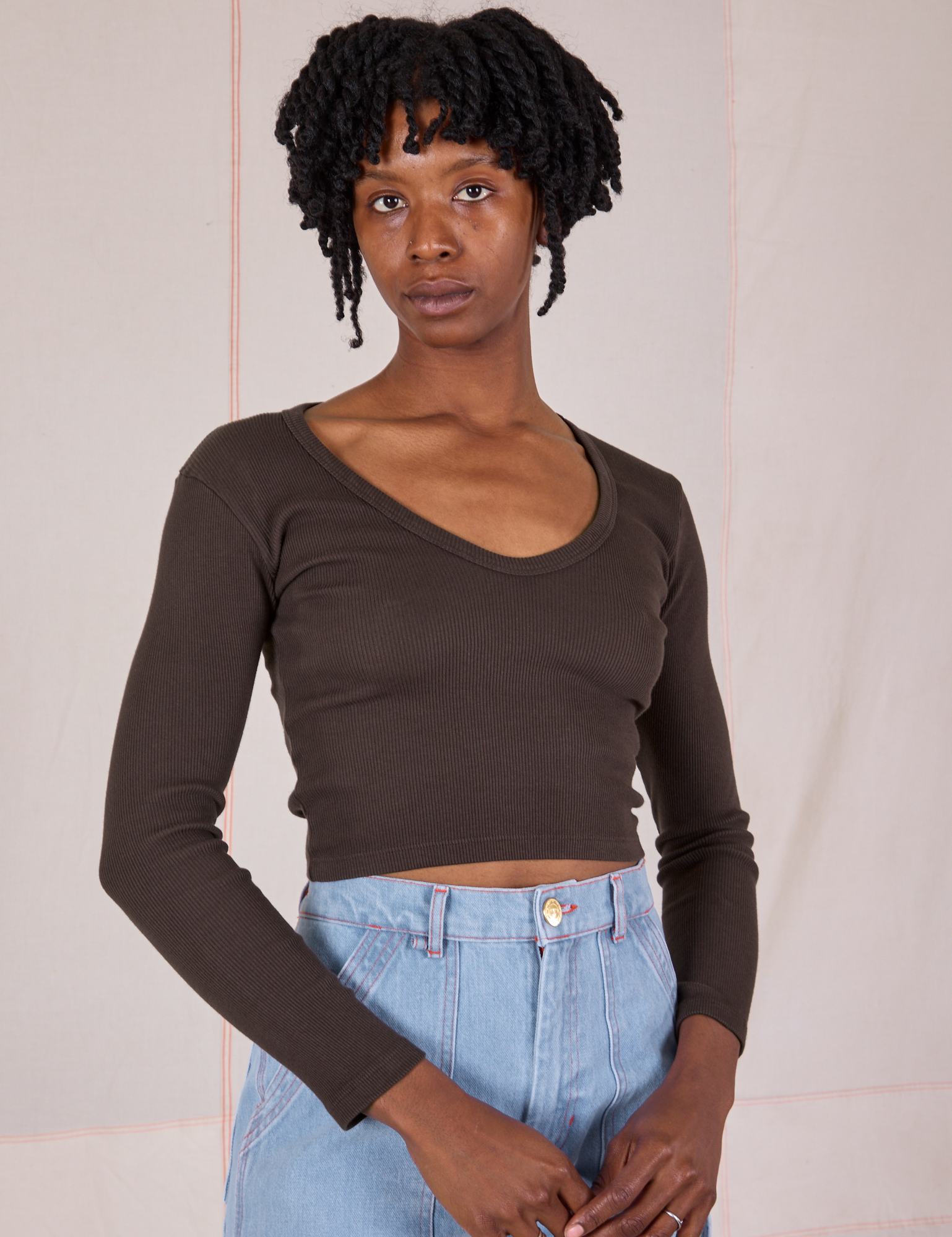 Cheyann is 5'11" and wearing XS Long Sleeve V-Neck Tee in Espresso Brown