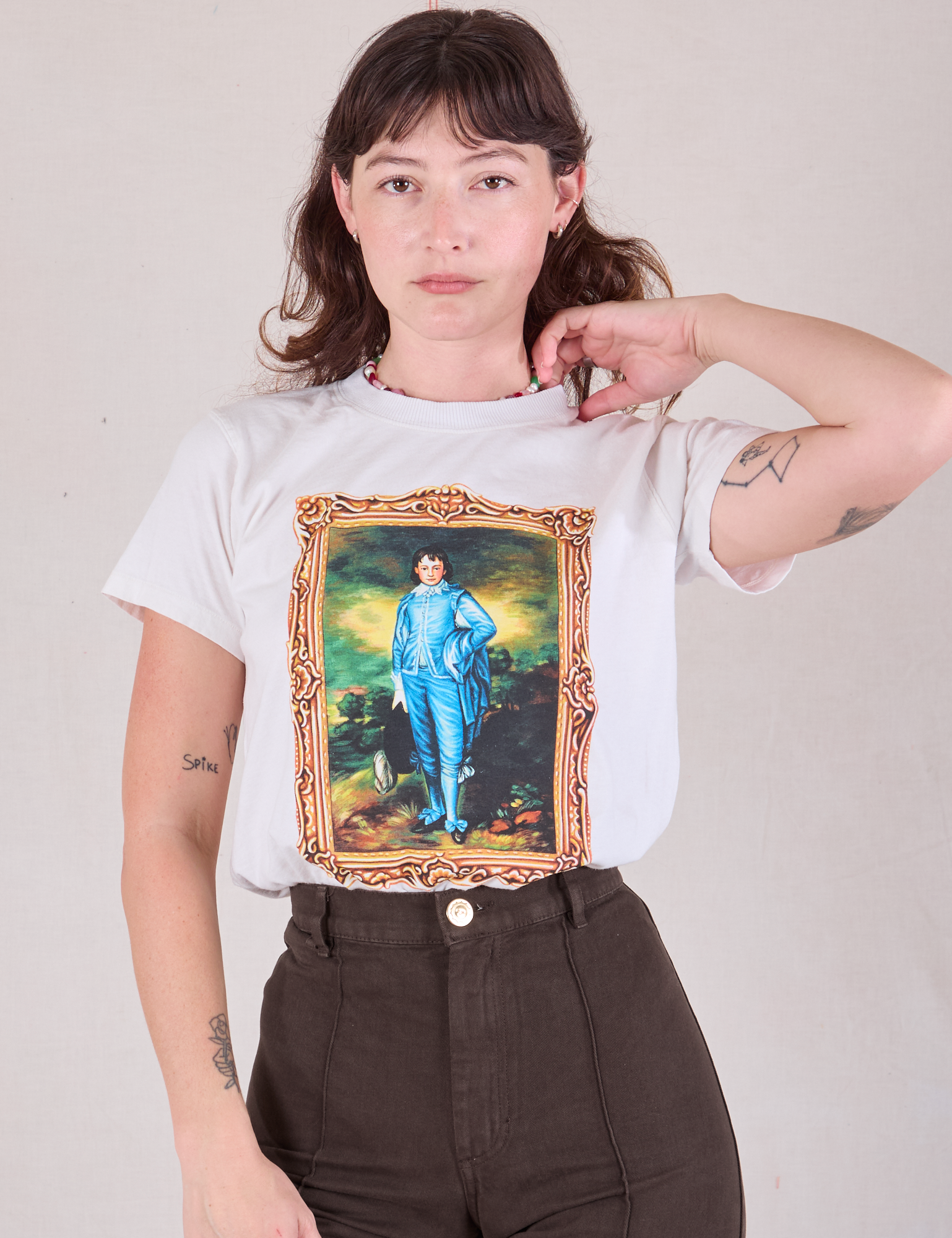 Alex is 5&#39;8&quot; and wearing P Masters Organic Tee in Blue Boy tucked into espresso Western Pants