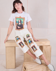 Alex is wearing Masters Organic Tee in Mona Lisa paired with the Masters Work Pants