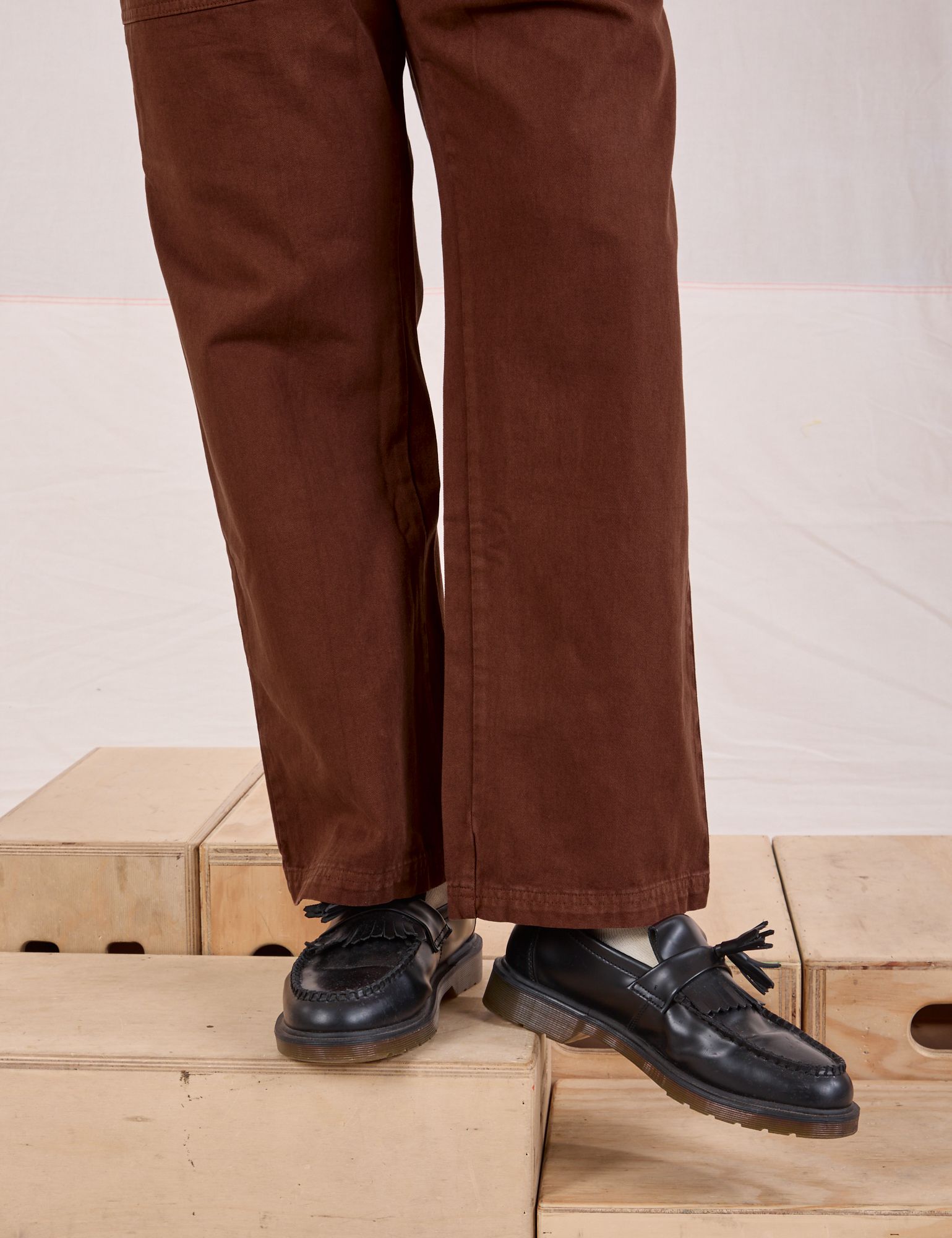 Mid-Rise Work Pants in Fudgesicle Brown pant leg close up on Issac