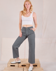 Margaret is wearing Mid-Rise Work Pants in Slate Grey and Cropped Tank in vintage tee off-white