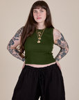 Sydney is 5'9" and wearing XXS Muscle Tee in Evergreen