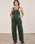 Tiara is wearing Original Overalls in Swamp Green