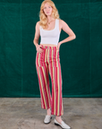 Margaret is 5'11" and wearing XS Stripe Work Pants in Cherry Candy paired with Cropped Tank in Vintage Tee Off-White