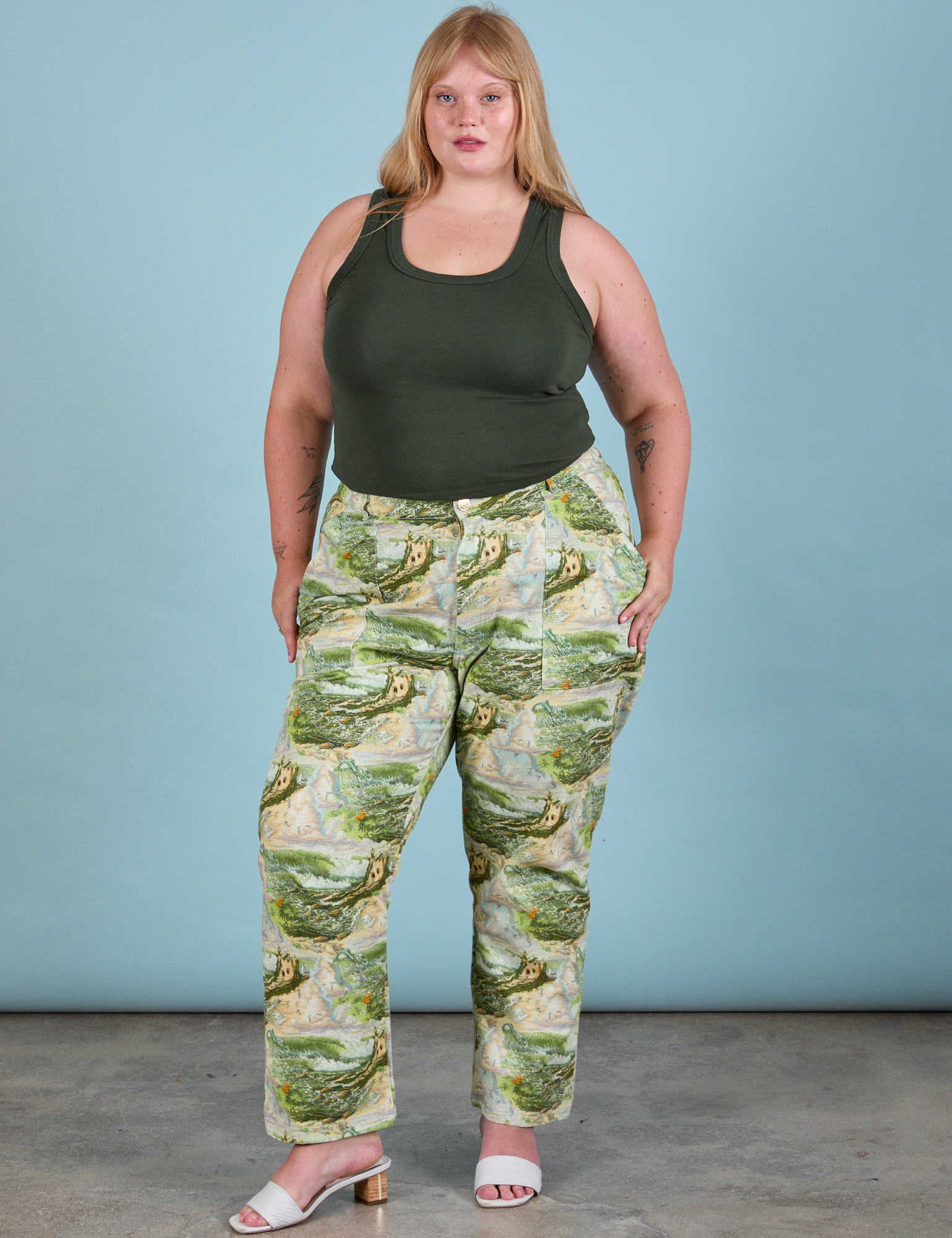 Juliet is wearing Work Pants in Ocean and Sky and swamp green Tank Top