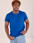 Issac is 5'10" and wearing S Organic Vintage Tee in Royal Blue