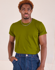 Issac is wearing Organic Vintage Tee in Summer Olive