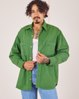 Jesse is wearing Oversize Overshirt in Lawn Green and vintage off-white Cropped Tank Top