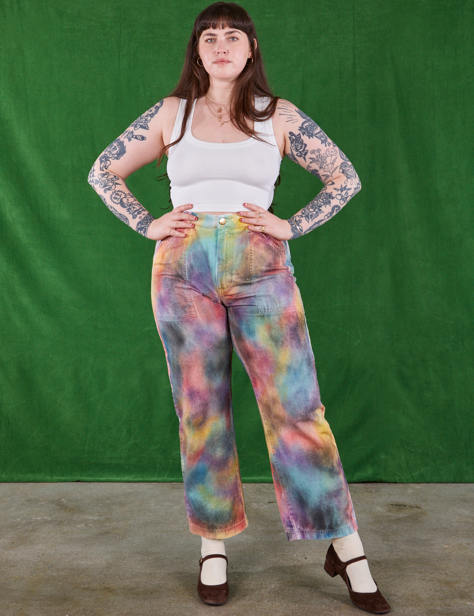 Sydney is 5'8" and wearing size L  Airbrush Palette Work Pants paired with a Cropped Tank in Vintage Tee Off-White