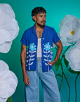 Jesse is wearing Paintstamped Pantry Button-Up in Daisy