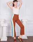 Hand-Painted Stripe Western Pants in Burnt Terracotta and vintage off-white Tank Top worn by Alex
