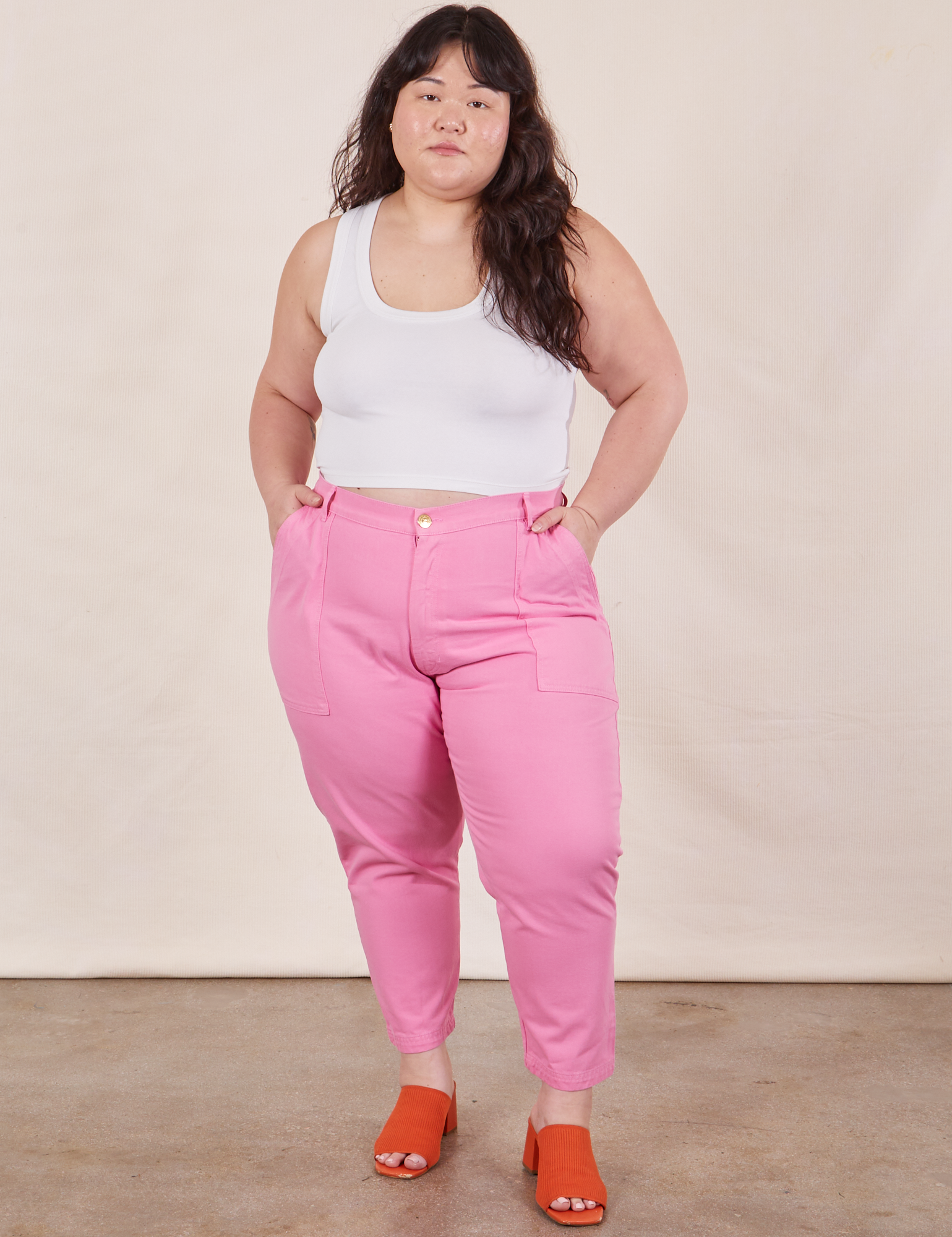Ashley is wearing Petite Pencil Pants in Bubblegum Pink and vintage off-white Cropped Tank Top