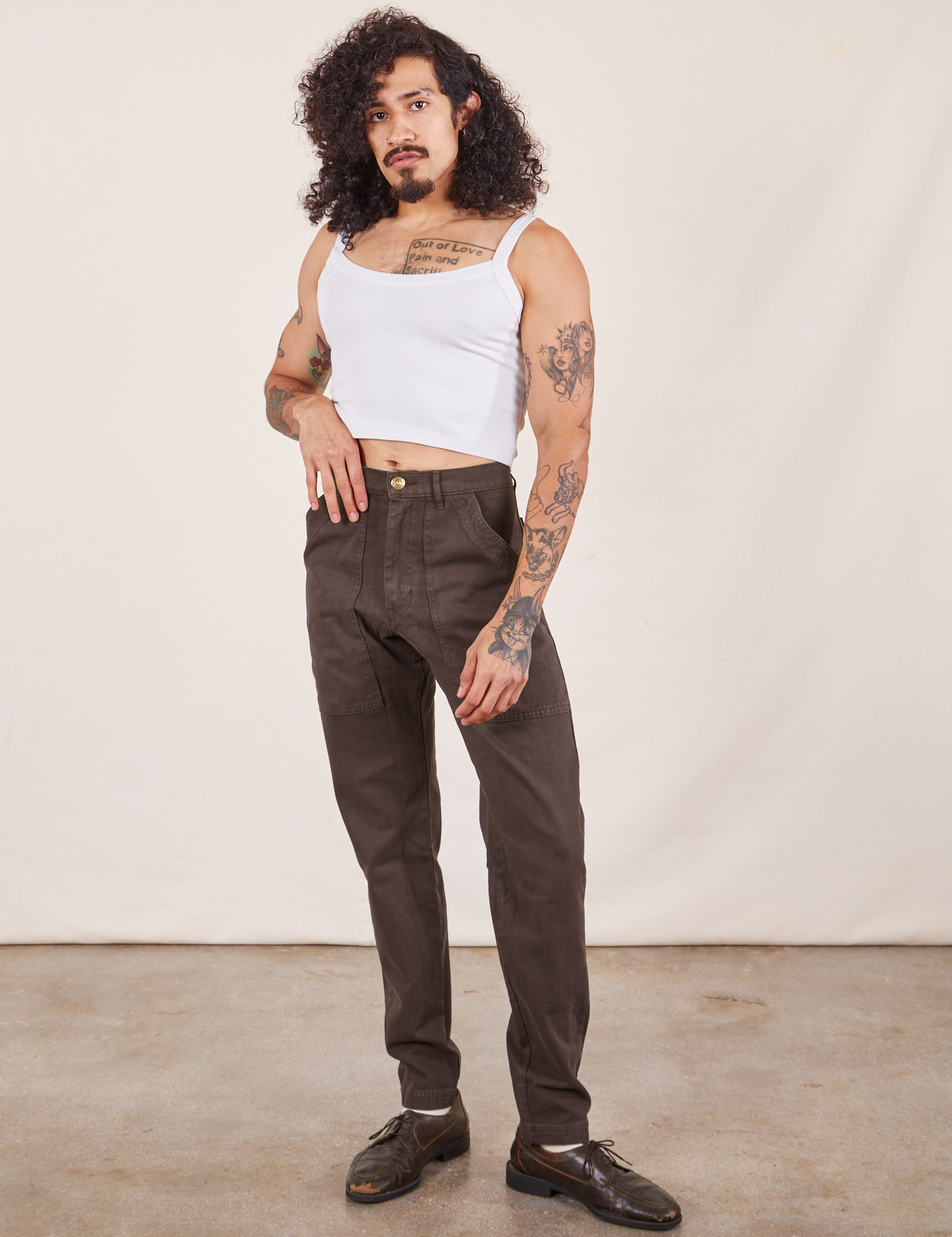 Jesse is wearing Pencil Pants in Espresso Brown and vintage off-white Cami