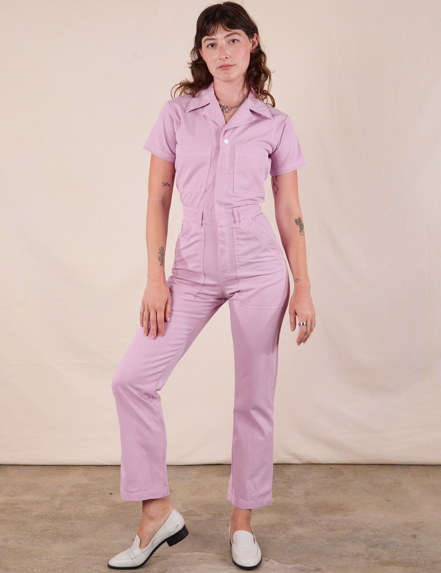 Alex is 5&#39;8&quot; and wearing XXS Short Sleeve Jumpsuit in Lilac