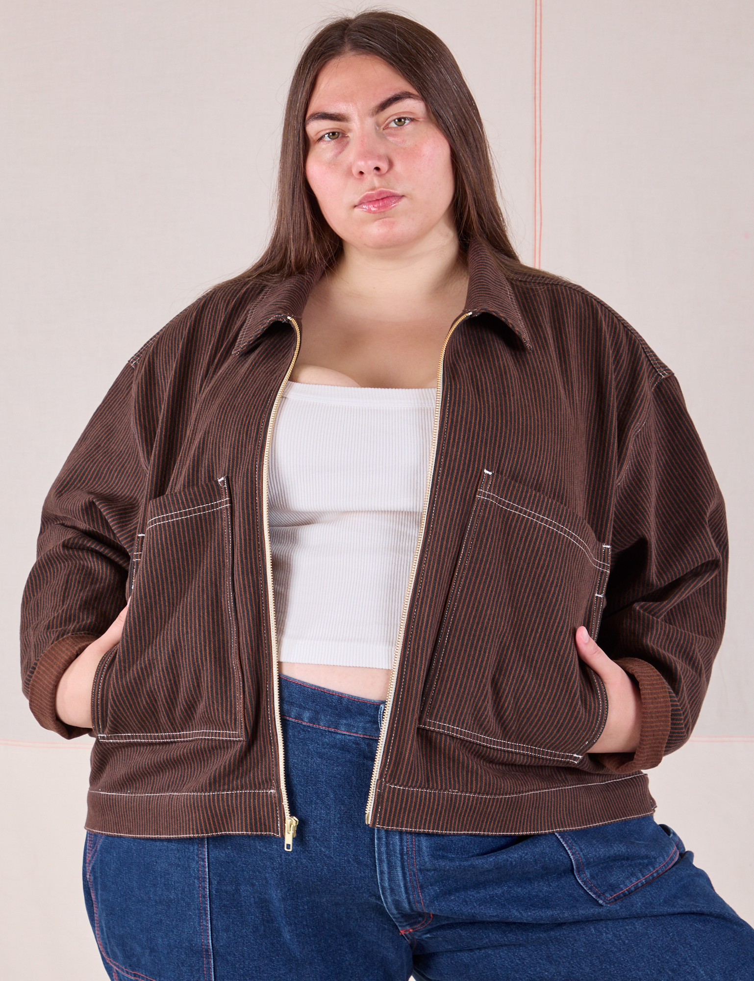 Marielena is 5'8" and wearing 1XL Mechanic Jacket in Fudgesicle Brown