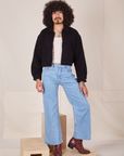 Ricky Jacket in Basic Black, vintage off-white Tank Top and light wash Sailor Jeans worn by Jesse