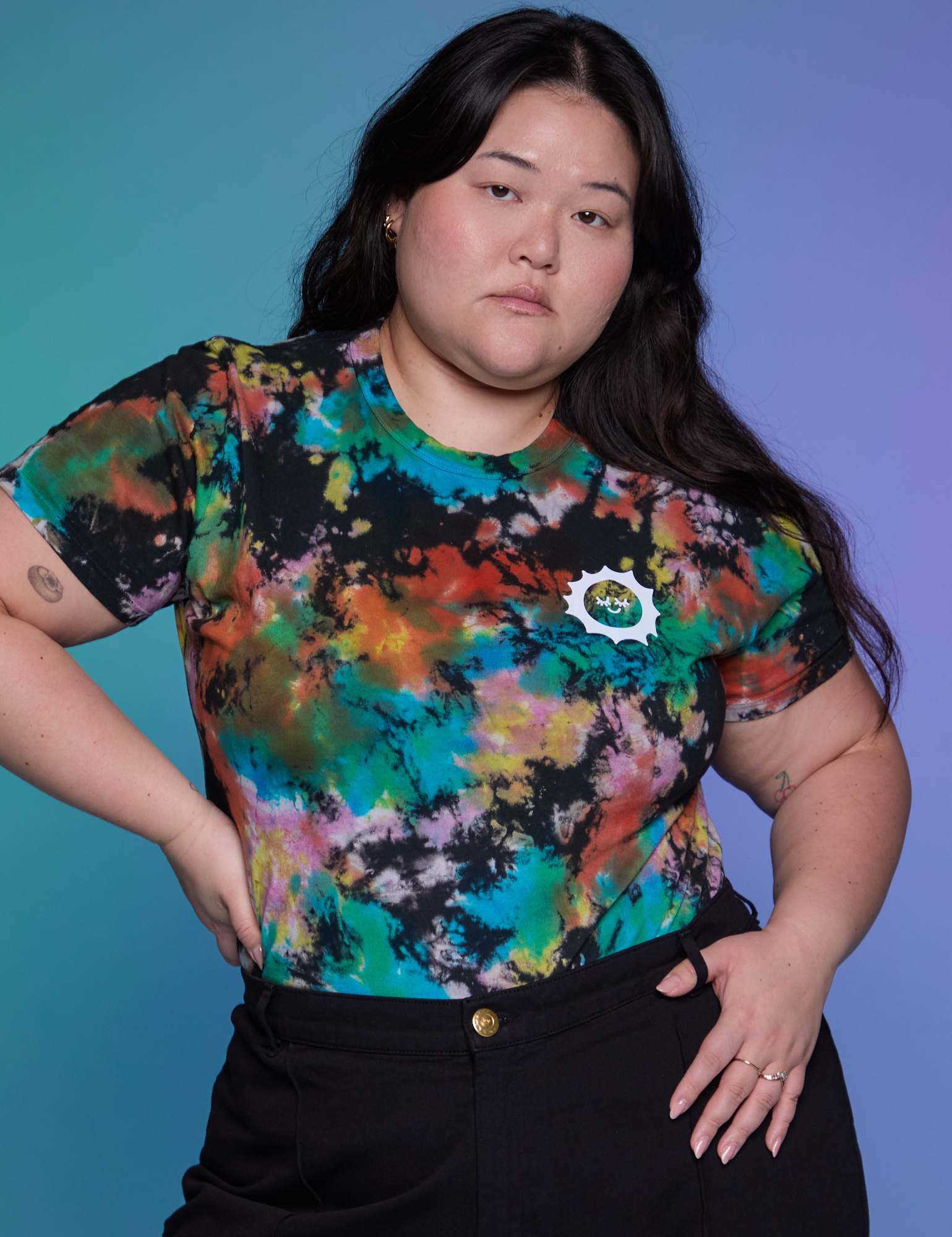 Ashley is 5'7" and wearing L Classic Tee in Rainbow Magic Waters