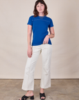 Alex is wearing JV Tee in Royal Blue paired with vintage tee off-white Western Pants