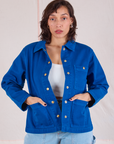 Tiara is 5'4" and wearing XS Denim Work Jacket in Royal Blue