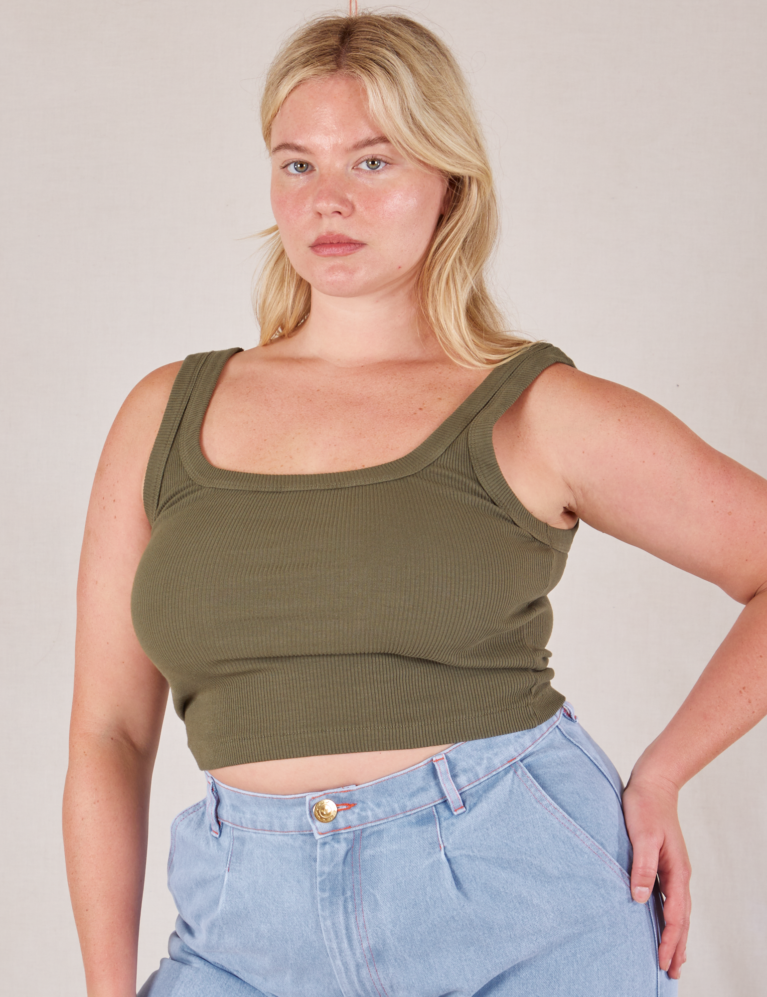 Lish is 5’8” and wearing L Square Neck Tank in Surplus Green