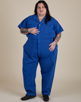 Sam is 5'10" and wearing 4XL Short Sleeve Jumpsuit in Royal Blue