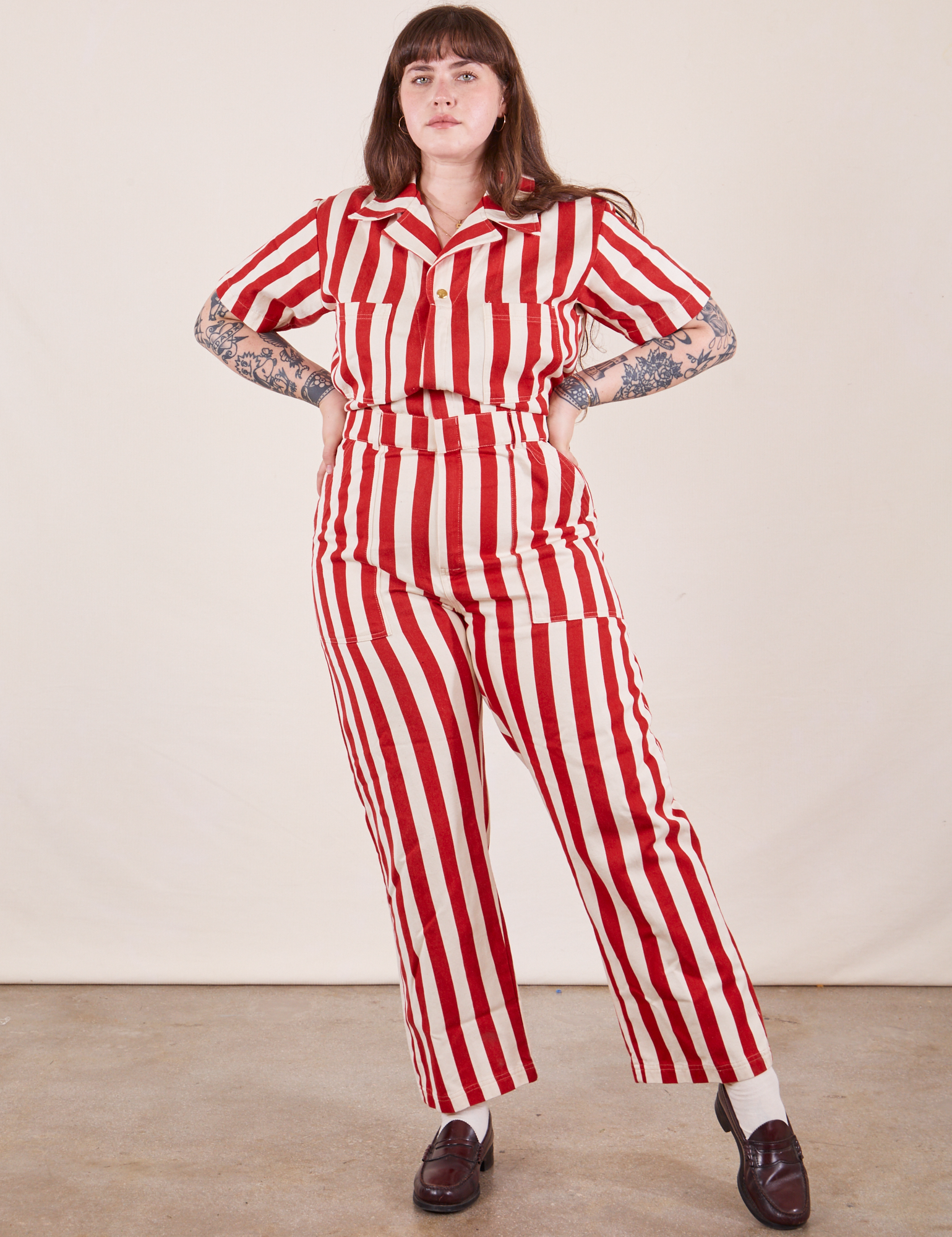 Sydney is 5'9" and wearing L Cherry Stripe Jumpsuit