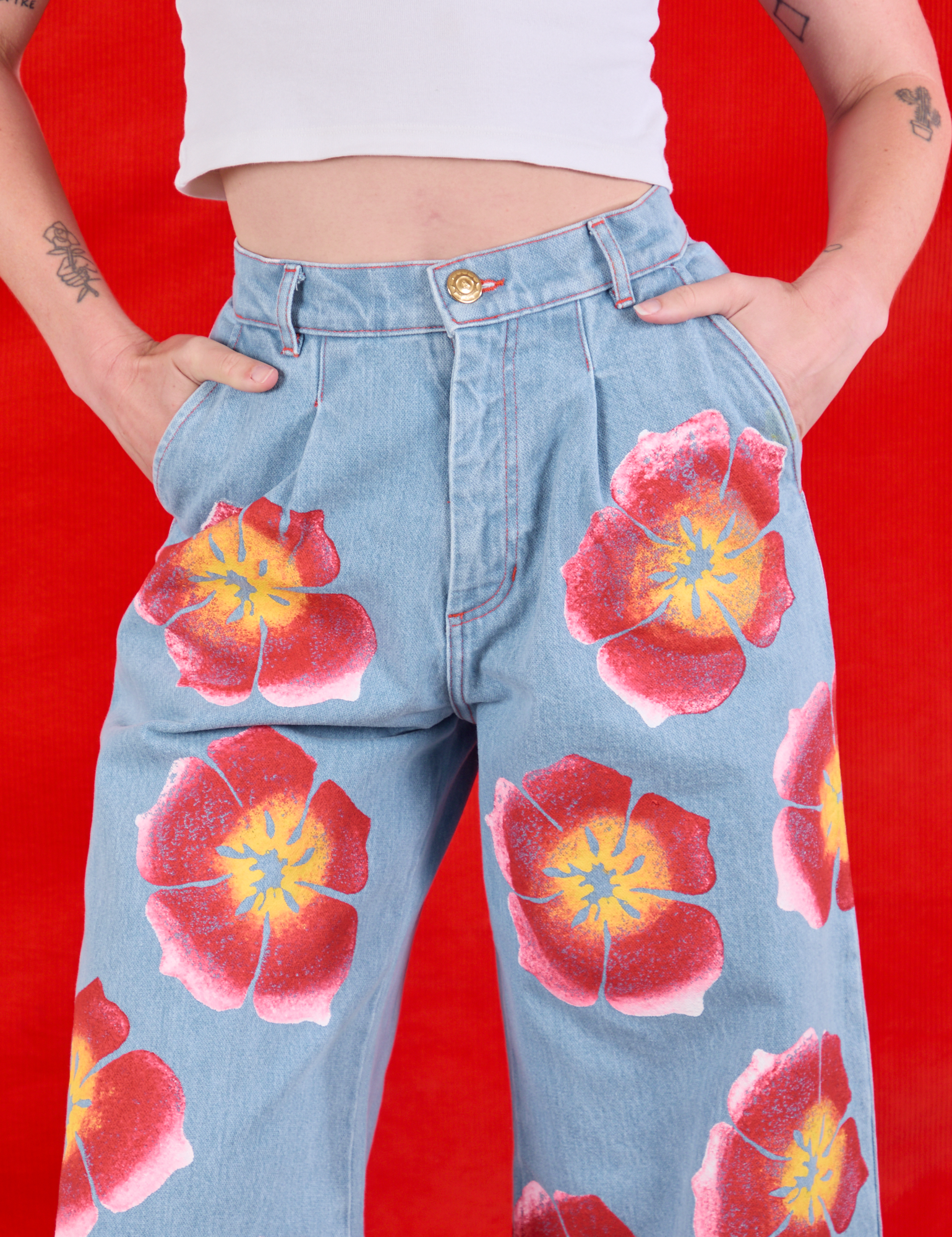 Wide Leg Denim Trousers in Painted Flowers front close up on Alex
