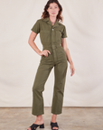 Alex is 5'8" and wearing XXS Short Sleeve Jumpsuit in Surplus Green