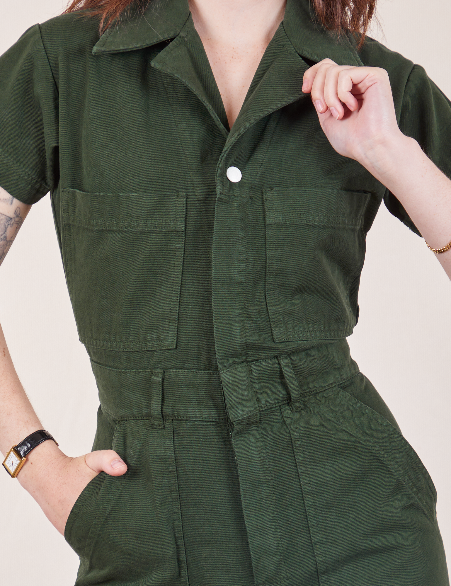 Petite Short Sleeve Jumpsuit in Swamp Green front close up on Hana