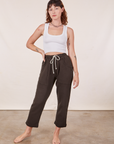 Alex is 5'8" and wearing XXS Cropped Rolled Cuff Sweatpants in Espresso Brown paired with vintage off-white Cropped Tank Top