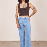 Jesse is wearing Cropped Tank Top in Espresso Brown and light wash Sailor Jeans