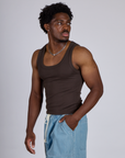 Angled front view of The Tank Top in Espresso Brown on Isaac