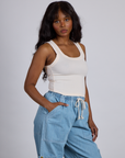 Angled front view of  The Tank Top in Vintage Tee Off-White on Kandia